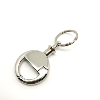 Porte-clés rétractable de couleur argentée avec personnalisation du logo en couleur argentée