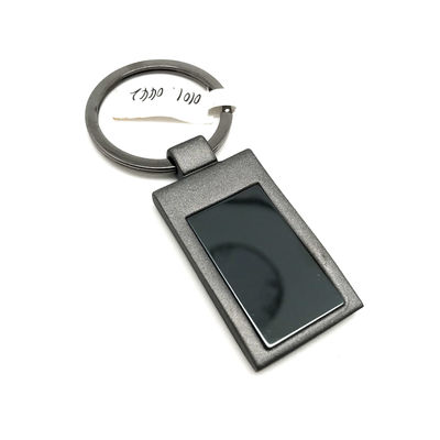 Porte-clés en métal argenté avec logo personnalisé pour les exigences du client