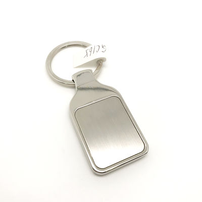 G porte-clés en métal en argent avec paquet polybag individuel