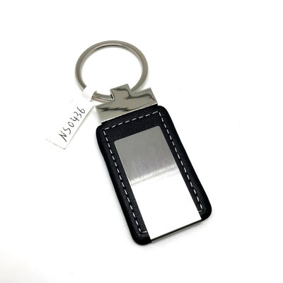 Porte-clés en cuir classique avec motif personnalisé emballé dans un polybag