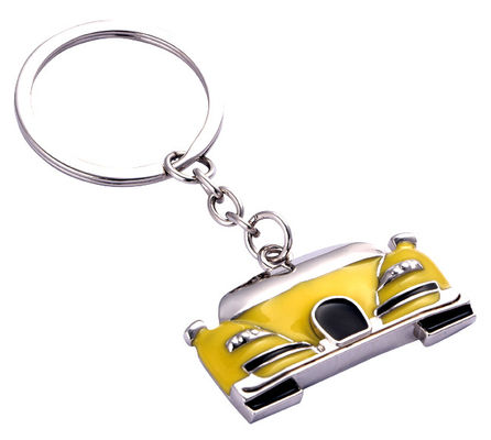 Un porte-clés métallique mignon avec un logo rempli d'huile durable pour un usage quotidien