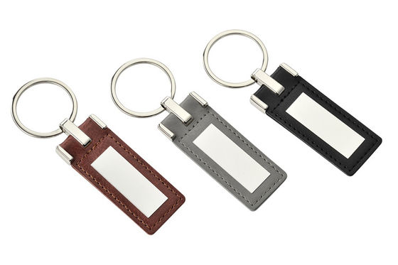 Le porte-clés en cuir fait sur commande promotionnel Debossing a personnalisé Logo Zinc Alloy Material