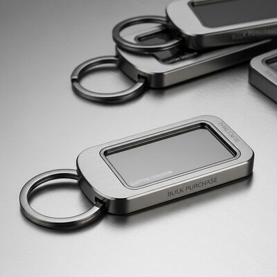 Bon prix Porteur de porte-clés en métal pour logo personnalisé OEM ODM Porteur de porte-clés en métal adapté à la gravure de logo personnalisé et à l'achat en vrac en ligne