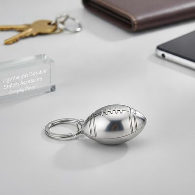 Bon prix Chaîne de clés métallique mignonne en forme de football 15 grammes Accessoire élégant et résistant en ligne