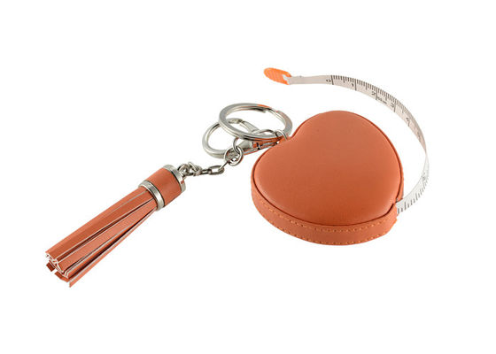 Bon prix Le laser gravant le ruban métrique escamotable de glands de coeur attachent le cadeau de souvenir en ligne